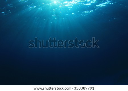 Underwater blue background in sea Royalty-Free Stock Photo #358089791