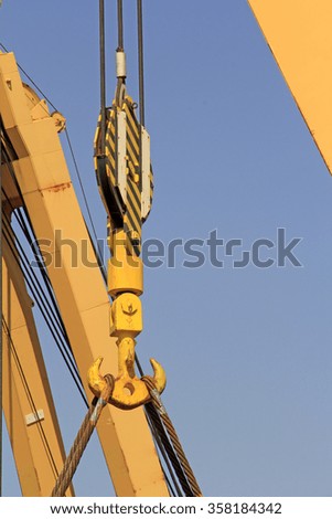 crane sling in the sky, closeup of photo