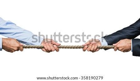 Tug war, two businessman pulling a rope in opposite directions isolated on white background Royalty-Free Stock Photo #358190279