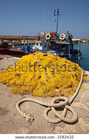 Rope and networks on a background of a fishing vessel