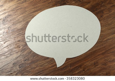 Bubble from paper on a wooden background