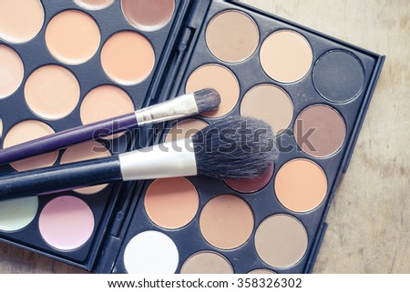shadow kit with brush for make-up/toned photo