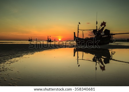 Silhouette of long tail boat at Sunset, Koh Samui, Thailand
