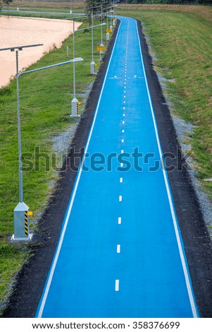 blue bicycle lane at Suvarnabhumi Airport in Bangkok ,Thailand.It is a track cyclist with a total length of more than 23.5. Kilometers per round.