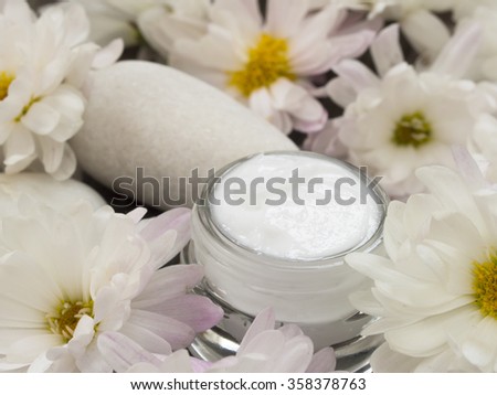 facial cream with flowers, freshness