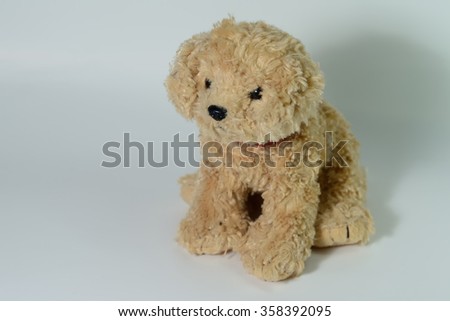 Cute puppy toy shot on white background
