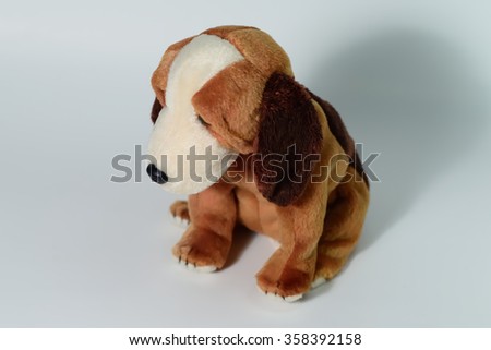 Cute puppy toy shot on white background
