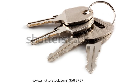 A bunch of keys isolated against a clean white background
