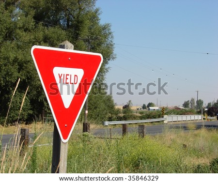 Yield sign along old country road