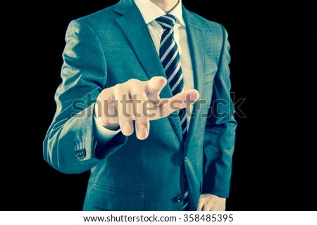 businessman ,fingertip in front of the camera