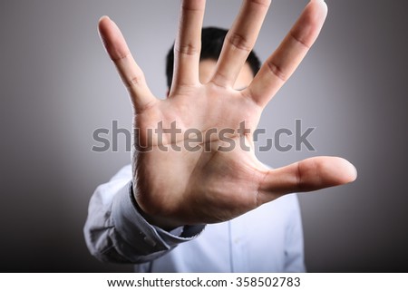 No More Concept,Stop Gesture. Man with raised opening hand making No more gesture. No more Unhealthy food, No more smoking,Alcohol. Royalty-Free Stock Photo #358502783