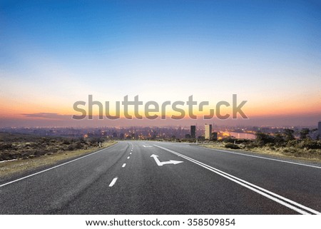 empty floor with backdrop on modern cityscape at sunrise time