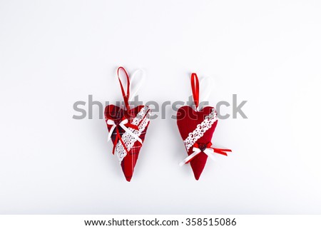 Two red valentine hearts isolated on white 
