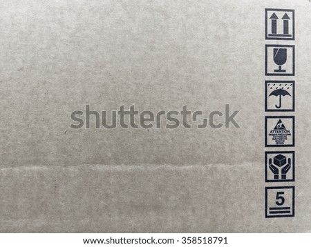 cardboard paper box with space and Safety fragile icon 