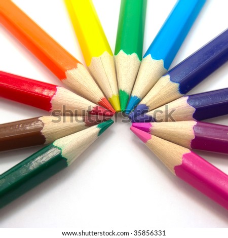 Colored pencils on a white background. Close-up. Macro.