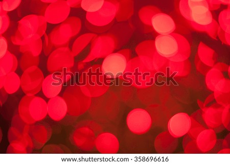 Texture. A festive background. The red glow of the lights