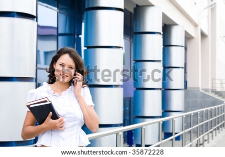 Photo of successful businesswoman calling by cellphone