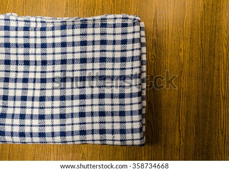 fold plaid blanket 