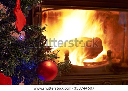 Christmas tree with log fire