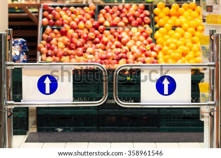 supermarket entrance with background of fruits baskets