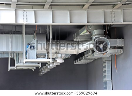 Industrial air conditioning and ventilation systems under roof Royalty-Free Stock Photo #359029694