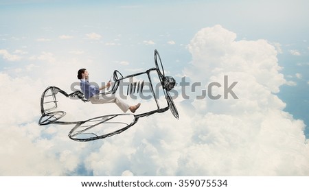 Woman in drawn airplane