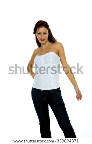 Woman in jeans and white top over white background