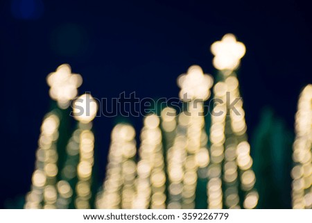 Abstract background of blurred lights with star