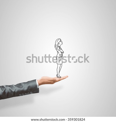 Caricatures of businesswoman in palm
