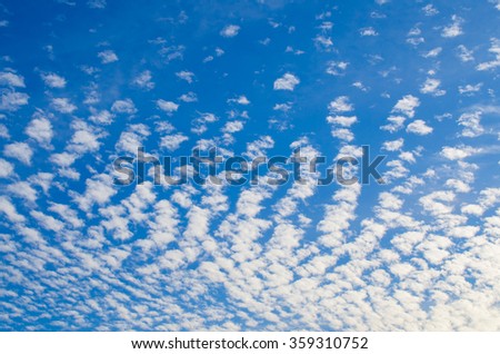 Altocumulus clouds in the blue sky Royalty-Free Stock Photo #359310752