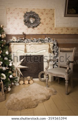 Fireplace with beautiful Christmas decorations in room
