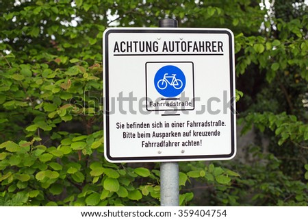 German sign that says: Attention car drivers. You are in a bicycle road. Pay attention to cyclists.