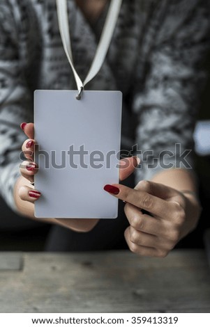 Woman's hand with card pass 