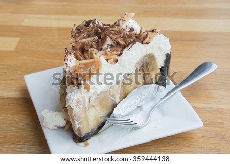 Banoffi pie , homemade bakery with banana , caramel, whipped cream and almond sliced , selective focus point.