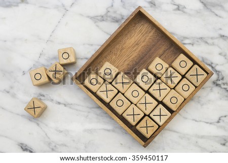 Wooden OX game on marble 