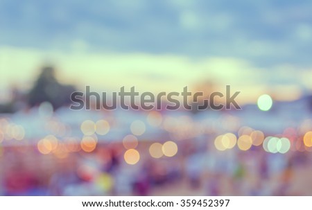 abstract blur image of day festival for background usage. (vintage tone)