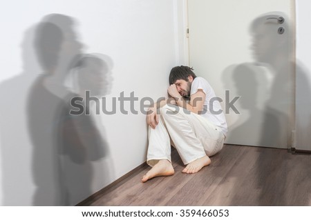 Scared and frightened man has hallucinations and sees ghosts Royalty-Free Stock Photo #359466053