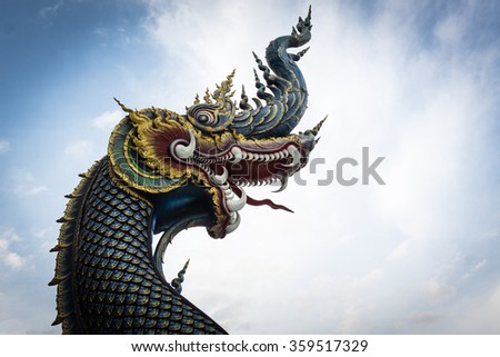 The naga head guarding The temple at Wat Rong Suea Ten in Chiang Rai Thailand,