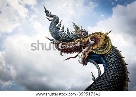 The naga head guarding The temple at Wat Rong Suea Ten in Chiang Rai Thailand,   sky background