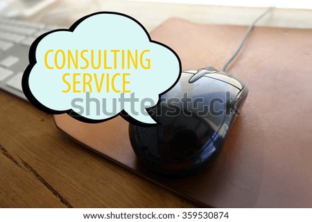 CONSULTING SERVICE concept with workstation on black mouse computer, business concept , business idea