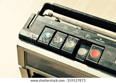 Dusty old radio with one cassette player, press rewind Royalty-Free Stock Photo #359537873