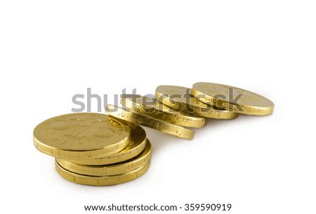 Stack of chocolate coins isolated on white background