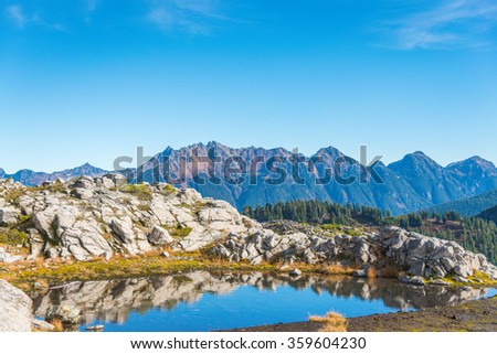 water reflection of the top mountain,some scenic view of mt Shuksan in Artist point area on the day,summer,Washington,USA.