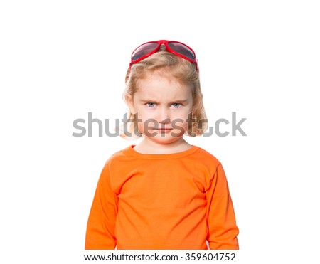 Little girl in red sunglasses on head . Isolated on white background