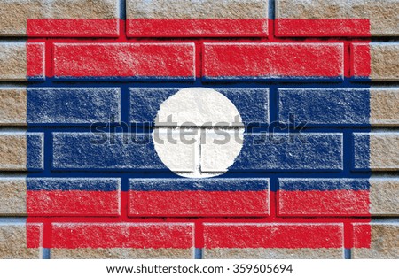 Laos flag painted on old brick wall texture background