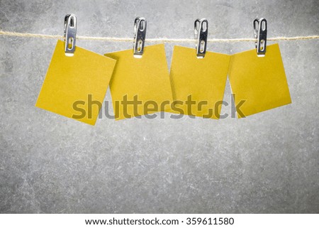 Notes paper cards in clothes pegs on rope