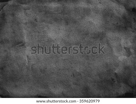 Old dark paper background. Grunge wall 