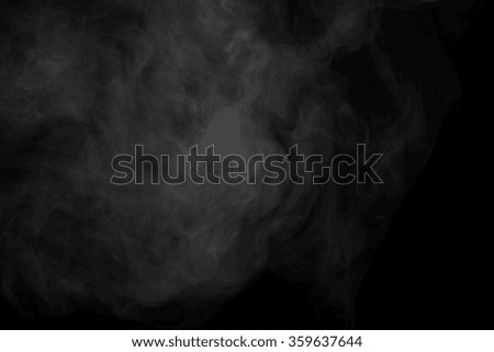 Abstract art. Grey smoke hookah on a black background. Inhalation. Steam Generator. The concept of aromatherapy.