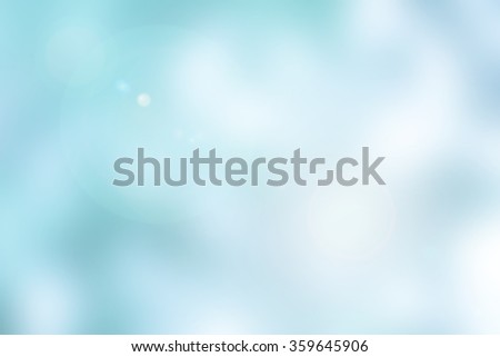 abstract blurred of brightening blue aqua background with flare light
