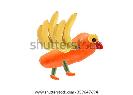 Creative food concept. Funny little bird, made of fruits and vegetables